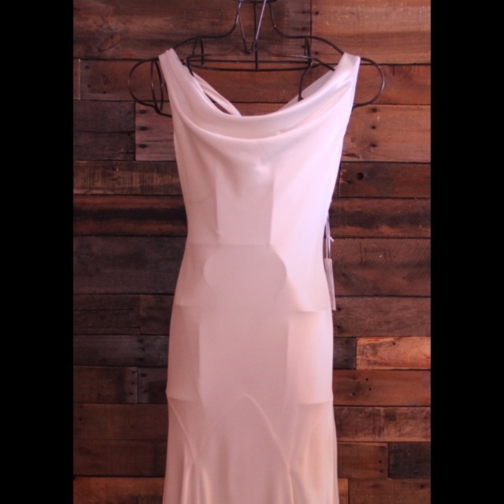 Never worn, satin wedding gown